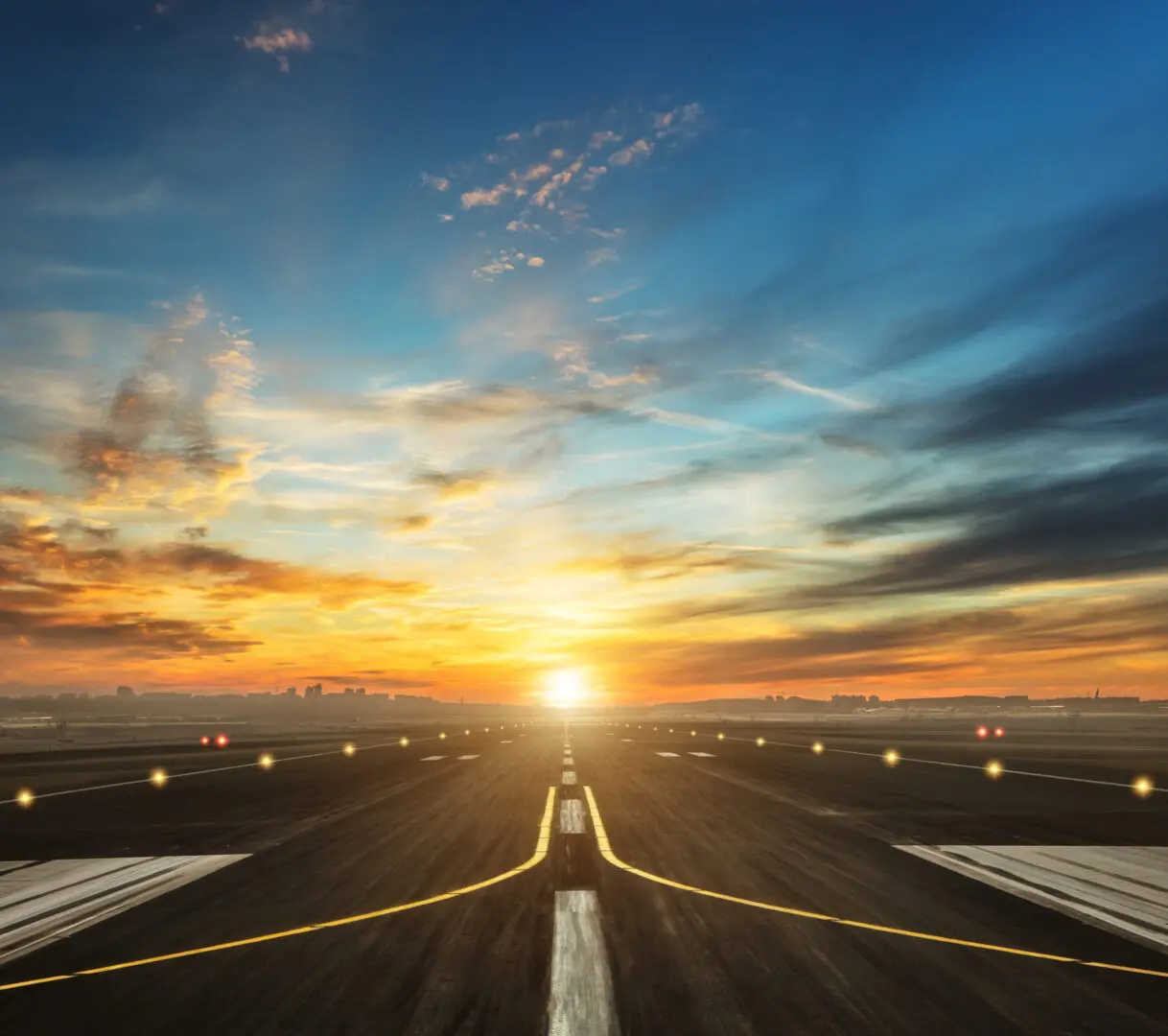 Airport runway at sunrise